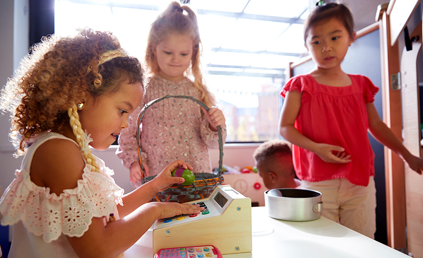 Young girls playing at nursery 